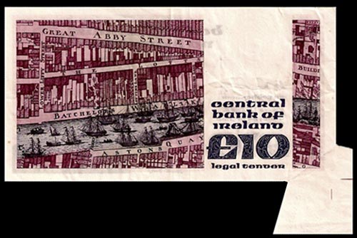 Extra paper error on a Central Bank of Ireland 10 Pound note 1981. Paper was folded during the cutting process